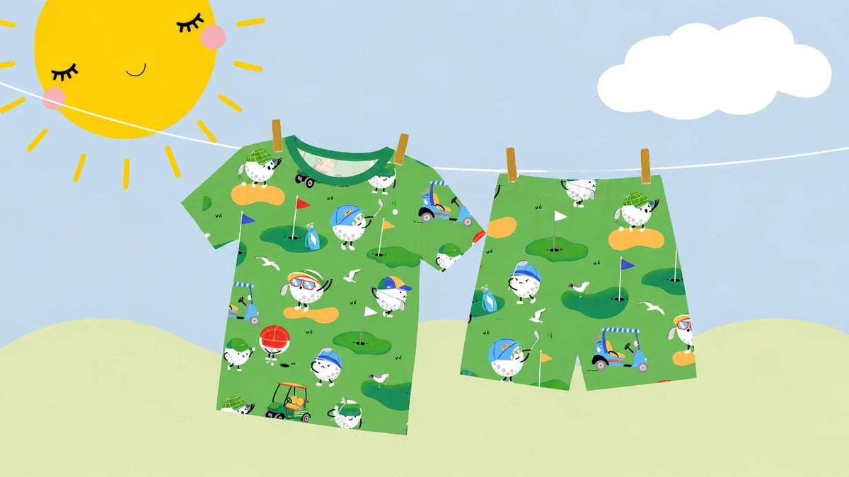 A soft nursery-style laundry scene showing printed bamboo pajamas hanging to dry in natural light, used as the hero image for a bamboo pajama washing and care guide.