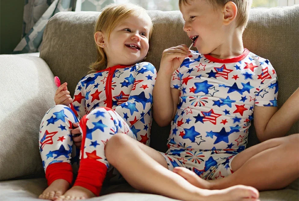 Children wearing zippy and short pajama set for baby pajama transition guide