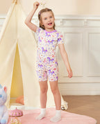 Lavender Unicorn Short Two-Piece Pajama Set - child wearing the short pajamas, full-length front view