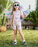 Lavender Unicorn Short Two-Piece Pajama Set - child wearing the short pajamas and fairy wings outdoors