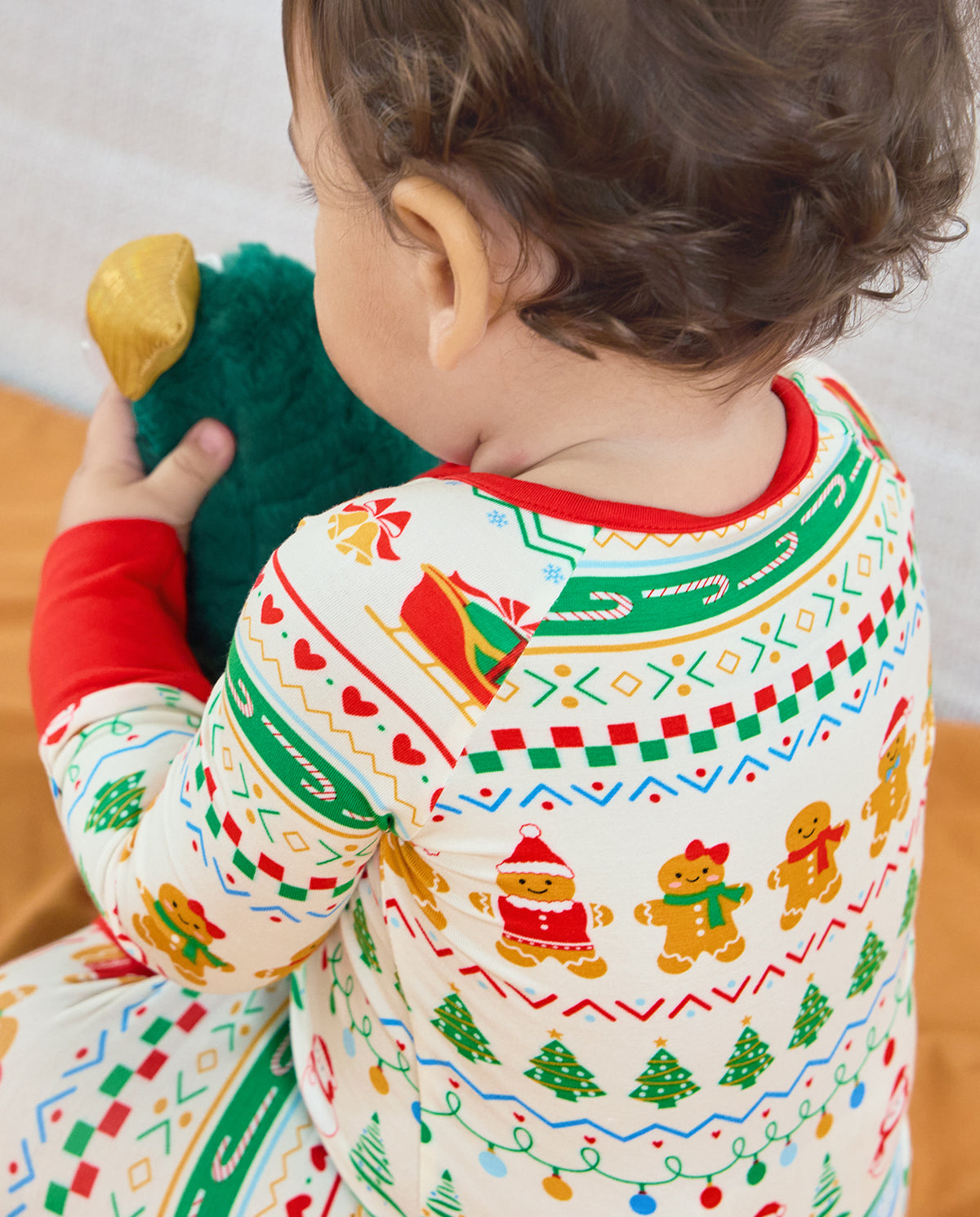 Close-up of the Christmas Fair Isle Bamboo Zippy back neckline, gingerbread friends and colored stripes