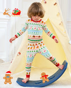 Child stepping onto a rocking toy in Christmas Fair Isle pajamas beside holiday illustrations