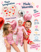 Three children wearing babee Reshinee Createe Cozee custom bamboo pajamas with pink and red heart prints