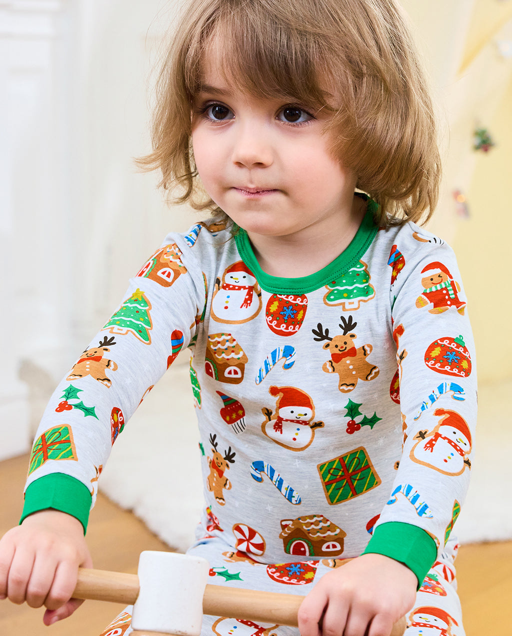 Front close-up of Gingerbread Gala top showing snowmen, cookie houses, and candy canes