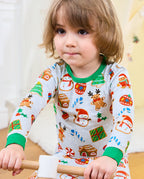 Front close-up of Gingerbread Gala top showing snowmen, cookie houses, and candy canes