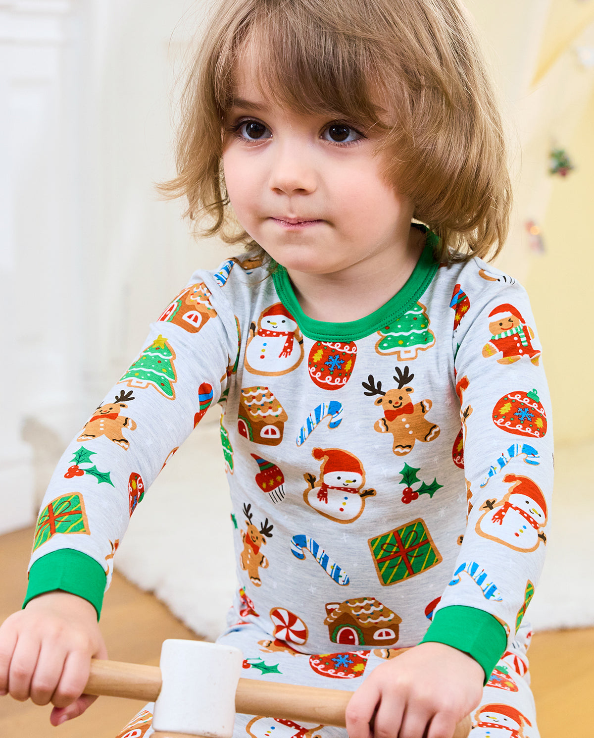 Front close-up of Gingerbread Gala top showing snowmen, cookie houses, and candy canes