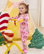 Child standing beside a yellow cart in the Gingerbread Lane zip-up romper.