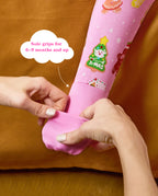 Hands folding a pink foot cuff on the Gingerbread Lane romper, with the original annotation.