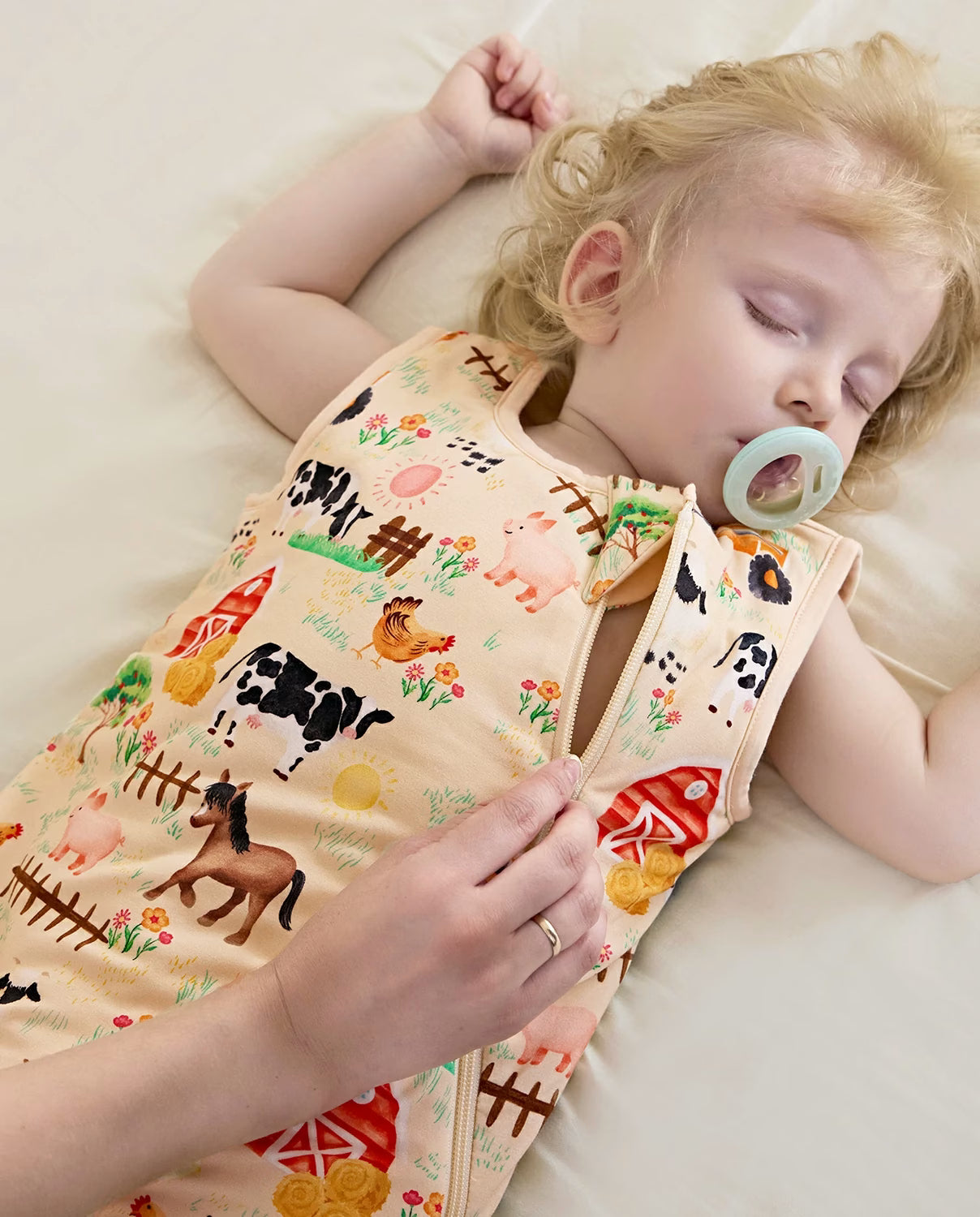 Happy Farmyard Bamboo Baby Sleep Sack, happy farmyard bamboo baby sleep sack side sleep 1