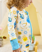 Rear close view of the Happy Hanukkah romper, showing stars, gifts and dreidel motifs.