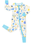Happy Hanukkah zip-up romper laid flat on white, with light blue trim and visible sole grips.