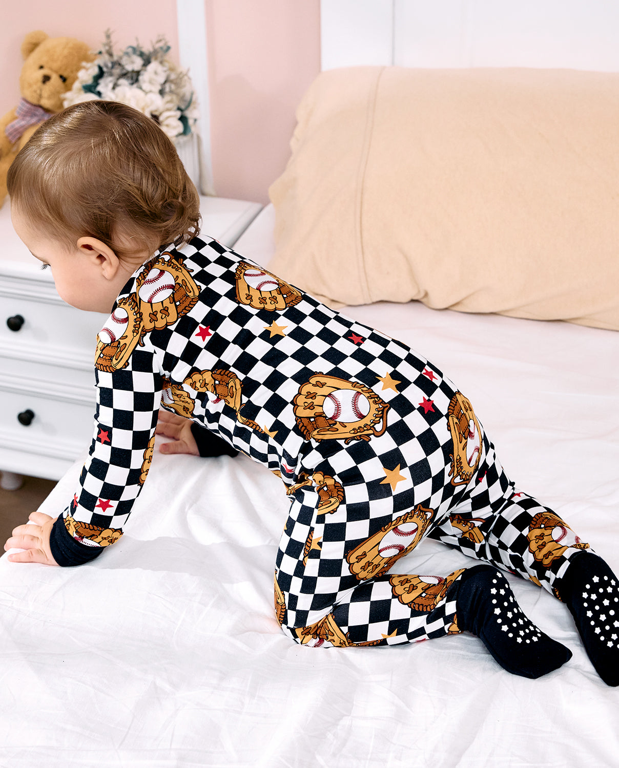 Junior Mitt Bamboo Zippy - baby wearing the zippy while crawling, back view