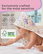 Lavender Unicorn Hooded Baby Bath Towels (2-Pack) - material information graphic with a baby in the unicorn-print towel