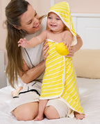 Lemon Tree Hooded Baby Bath Towels (2-Pack) - parent holding a baby wrapped in the striped hooded towel
