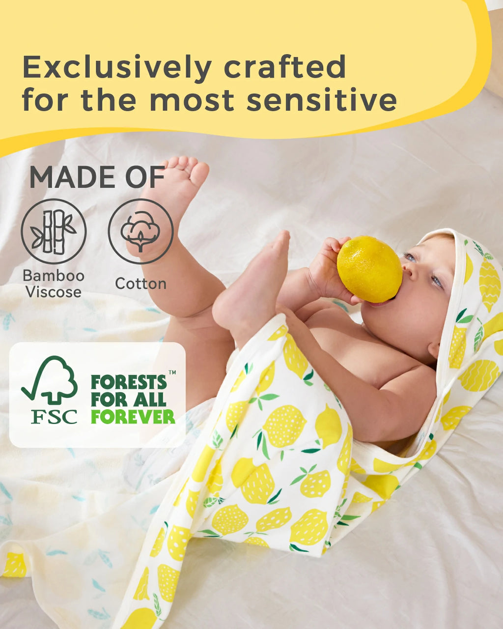 Lemon Tree Hooded Baby Bath Towels (2-Pack) - material information graphic with a baby wrapped in the lemon-print towel