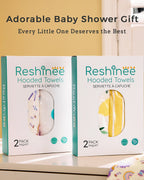 Lemon Tree Hooded Baby Bath Towels (2-Pack) - lemon and unicorn two-pack towel boxes displayed as gifts
