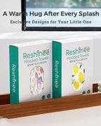 Lemon Tree Hooded Toddler Bath Towel - lemon and unicorn hooded towel retail boxes on a bathroom shelf