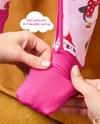 Hands folding a deep pink foot cuff on the Merry Penguins romper, with the original annotation.