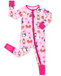 Merry Penguins zip-up romper with deep pink trim and sole-grip cuff, laid flat on white.