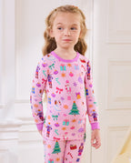 Close view of a child wearing the Pink Nutcracker long-sleeve top.