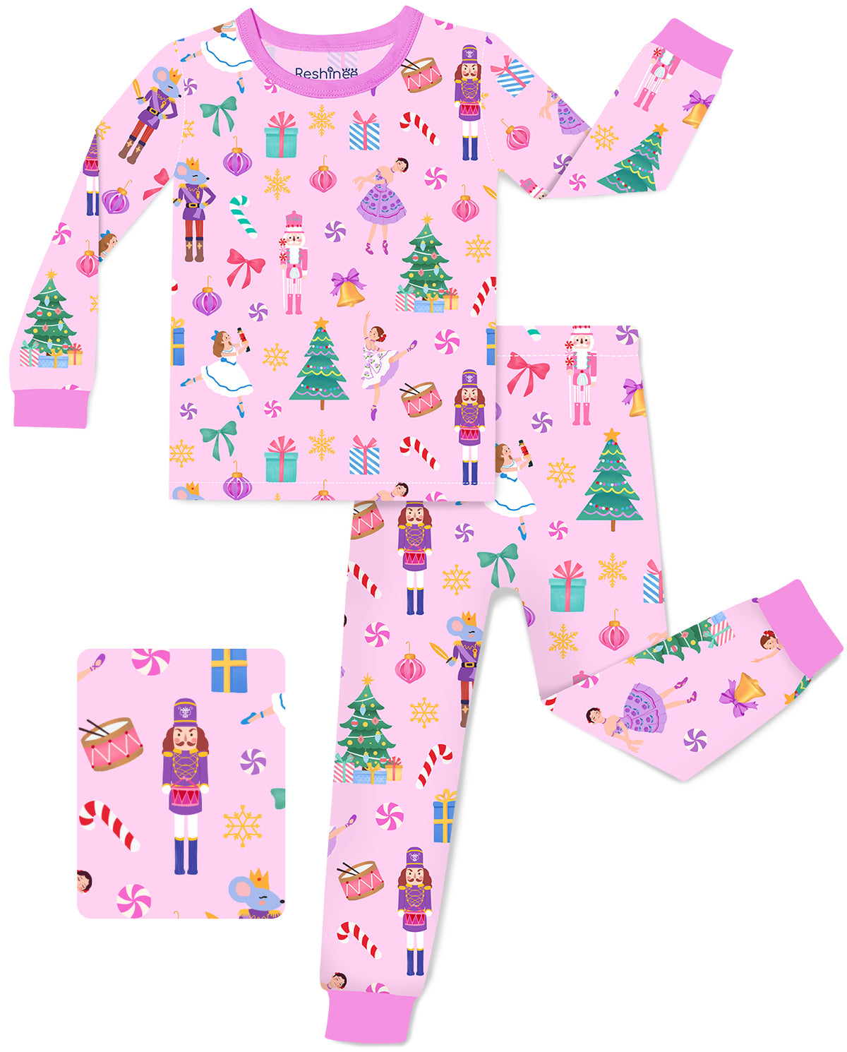 Pink Nutcracker long-sleeve top and matching pants with pink trim, laid flat on white.
