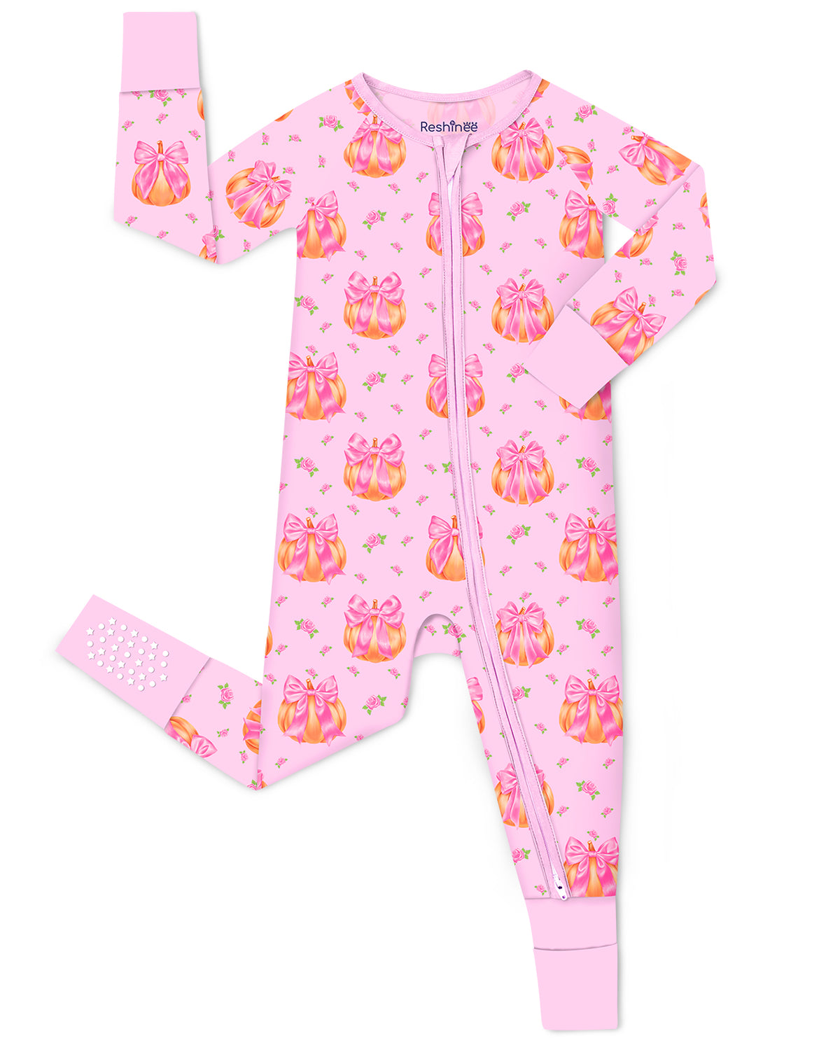 Pumpkin Bows zip-up romper with pink trim and a visible sole-grip cuff, laid flat on white.