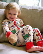 Child seated with bent knees in Santa Express Christmas truck zippy