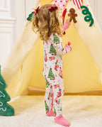 Rear view of a child standing in the Snuggle Sparkle romper.