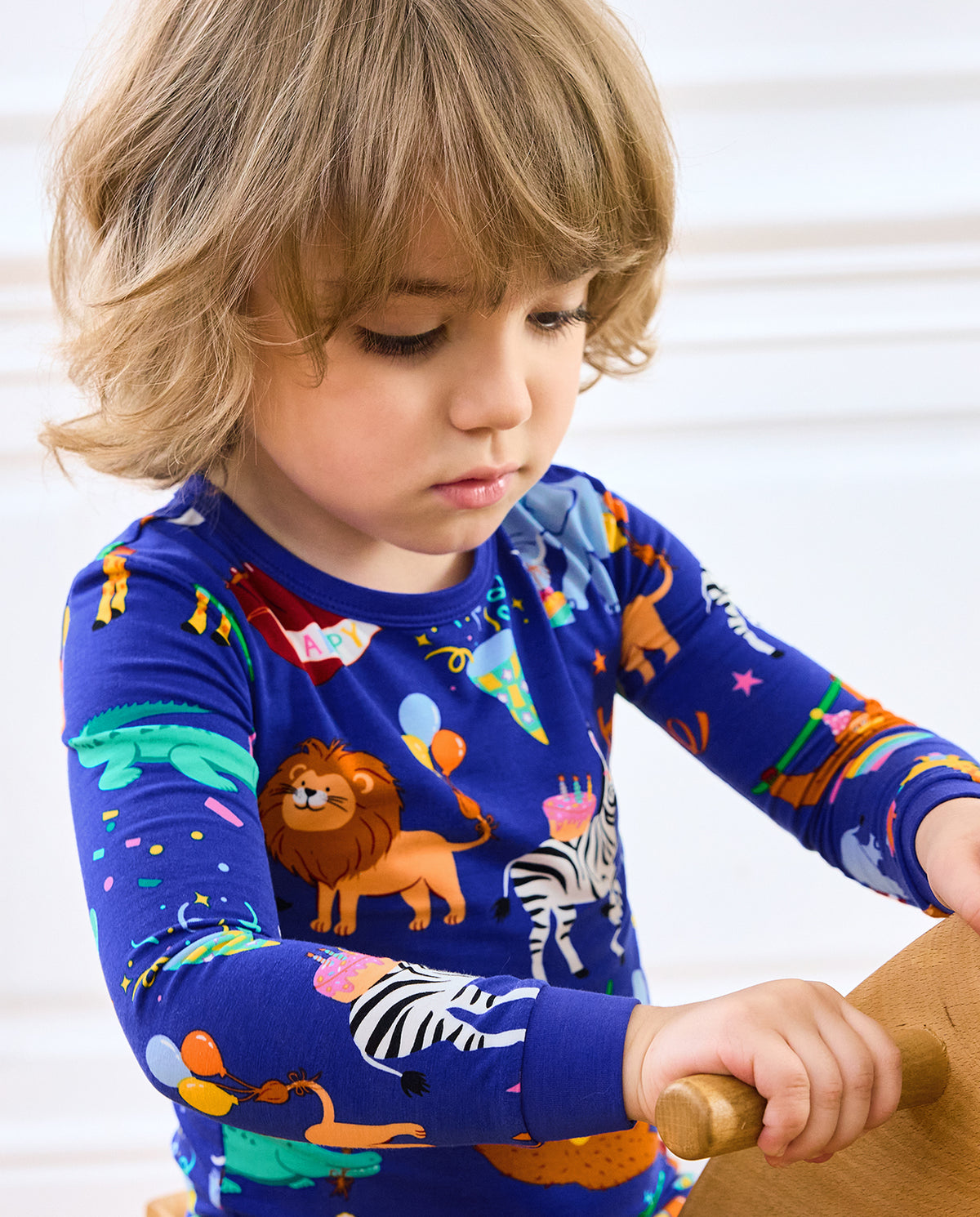 Close view of a child wearing Birthday Safari party-animal pajamas