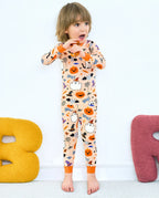 Boo Treats Long Two-Piece Pajama Set - child wearing the pajamas while standing, front view
