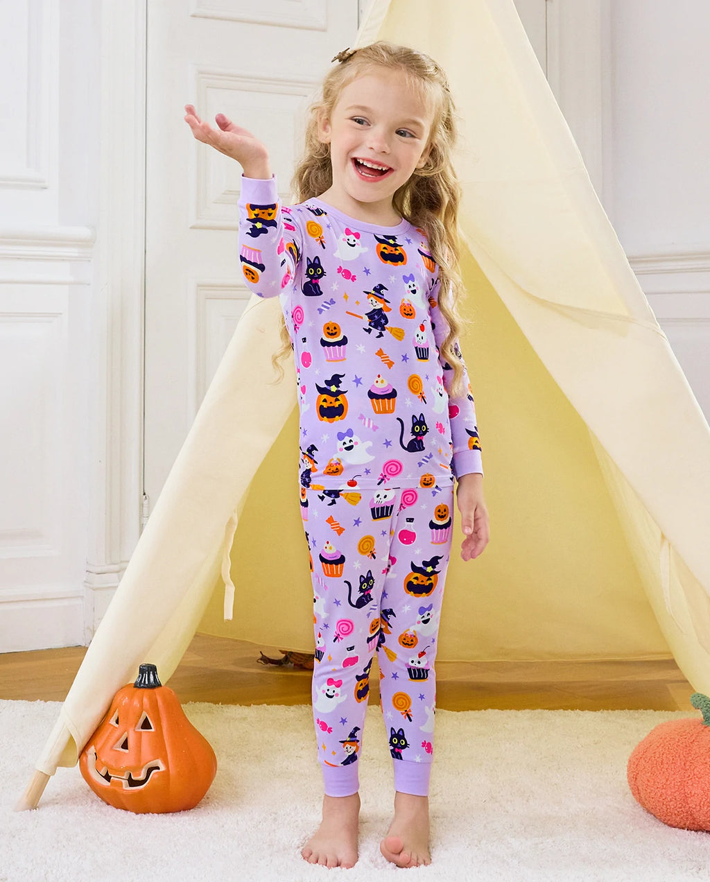 Candy Boo Long Two-Piece Pajama Set - child wearing the purple Halloween pajamas while standing in a play tent