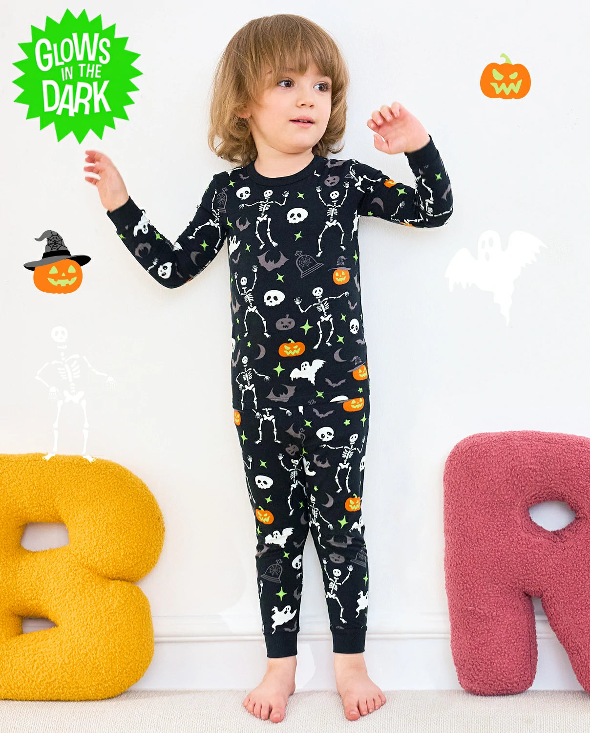 Dark Disco Long Two-Piece Pajama Set - child wearing the glow-print pajamas, full front view