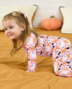 Baby crawling while wearing Ghost Bows Bamboo Zippy Halloween pajamas
