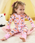 Baby wearing Ghost Bows Bamboo Zippy during active indoor play