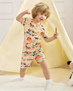 Happy Farmyard Short Two-Piece Pajama Set - child wearing the short pajamas while posing in a play tent