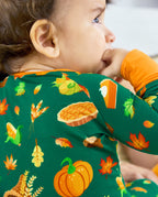 Close-up of the Harvest Feast print with pumpkin, pie, corn, wheat and autumn leaves.