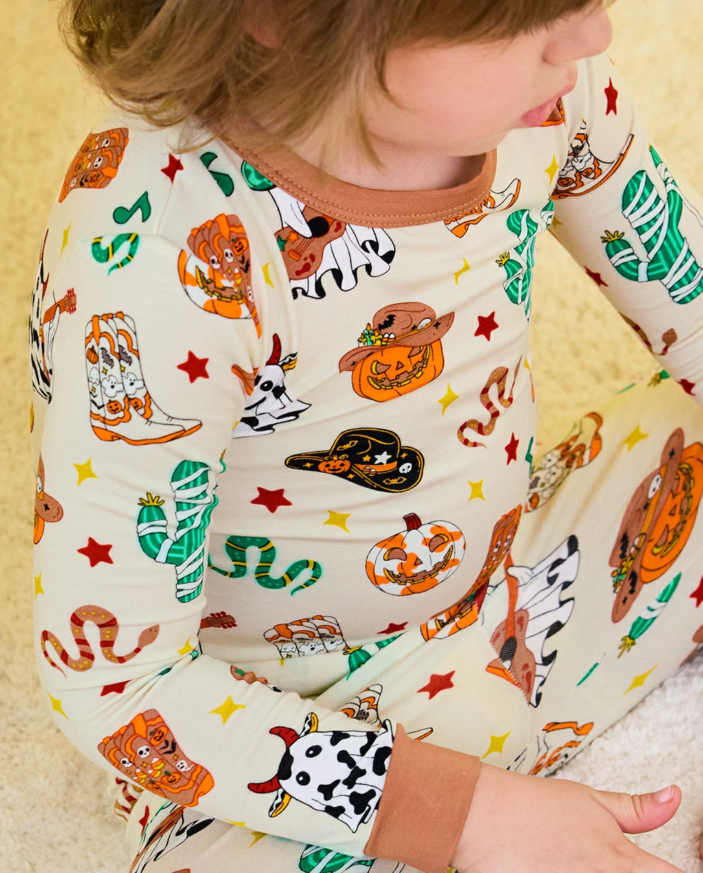 Howdy Halloween Long Two-Piece Pajama Set - close-up of the western Halloween print