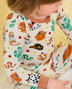 Howdy Halloween Long Two-Piece Pajama Set - close-up of the western Halloween print