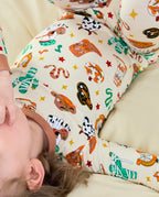 Howdy Halloween Long Two-Piece Pajama Set - close-up of the pajama print while lying down