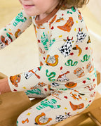 Howdy Halloween Long Two-Piece Pajama Set - close-up of the western print and brown cuffs