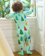 Baby standing by a window showing the full back of the Merry Trees Bamboo Zippy