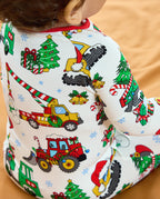 Close-up of Christmas crane trucks, tractors, trees and gifts on the back of the Merry Truckmas Bamboo Zippy.