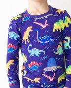 Close view of the neckline and dinosaur print on Neo Dino pajamas