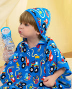 Ready? Go! Hooded Toddler Bath Towel - child wearing the hooded towel while holding a bubble toy