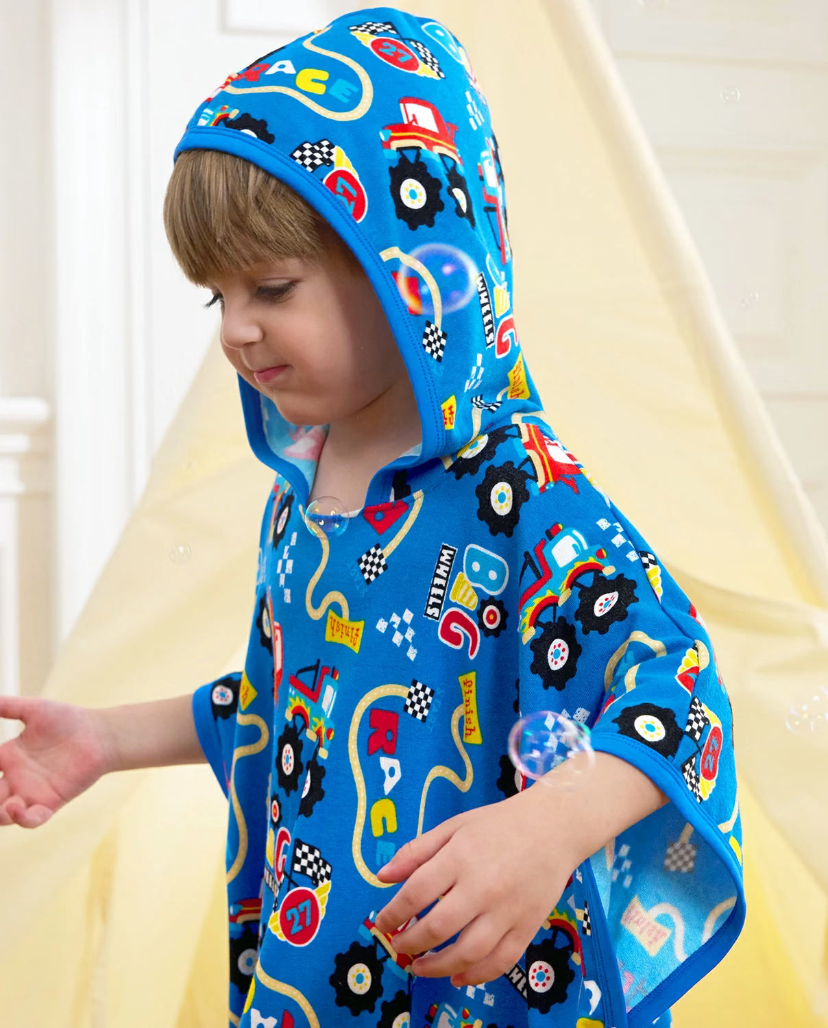 Ready? Go! Hooded Toddler Bath Towel - close-up side view of the hood and vehicle print