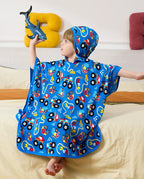 Ready? Go! Hooded Toddler Bath Towel - child wearing the hooded towel while playing with a toy shark