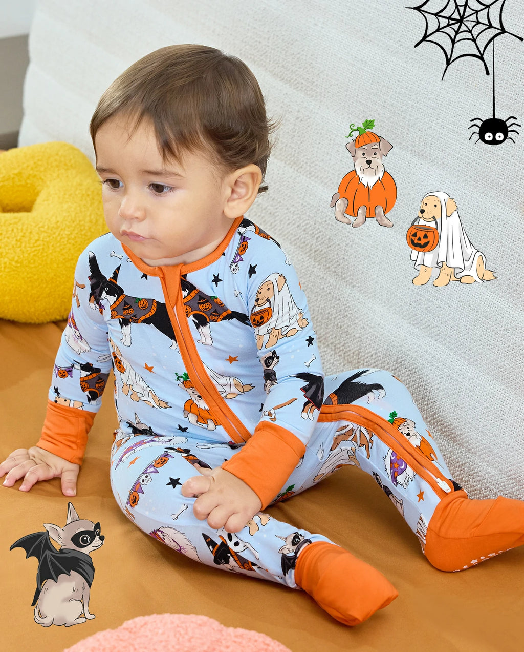 Baby wearing Spooky Pups Bamboo Zippy with Halloween dog graphics