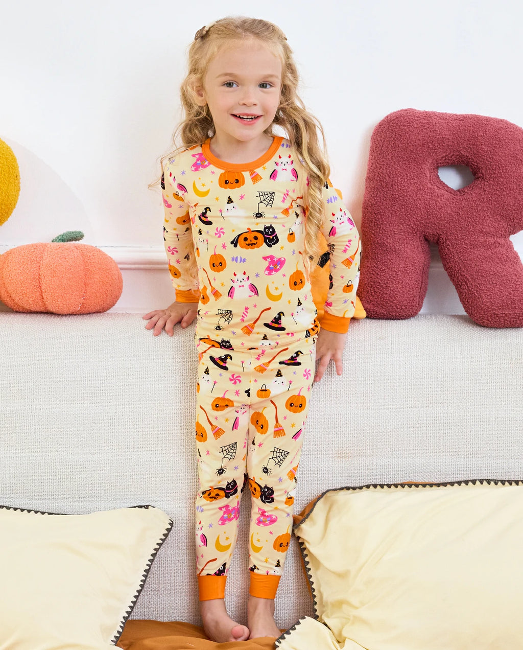 Spooky Sweet Long Two-Piece Pajama Set - child wearing the pajamas, full-length front view
