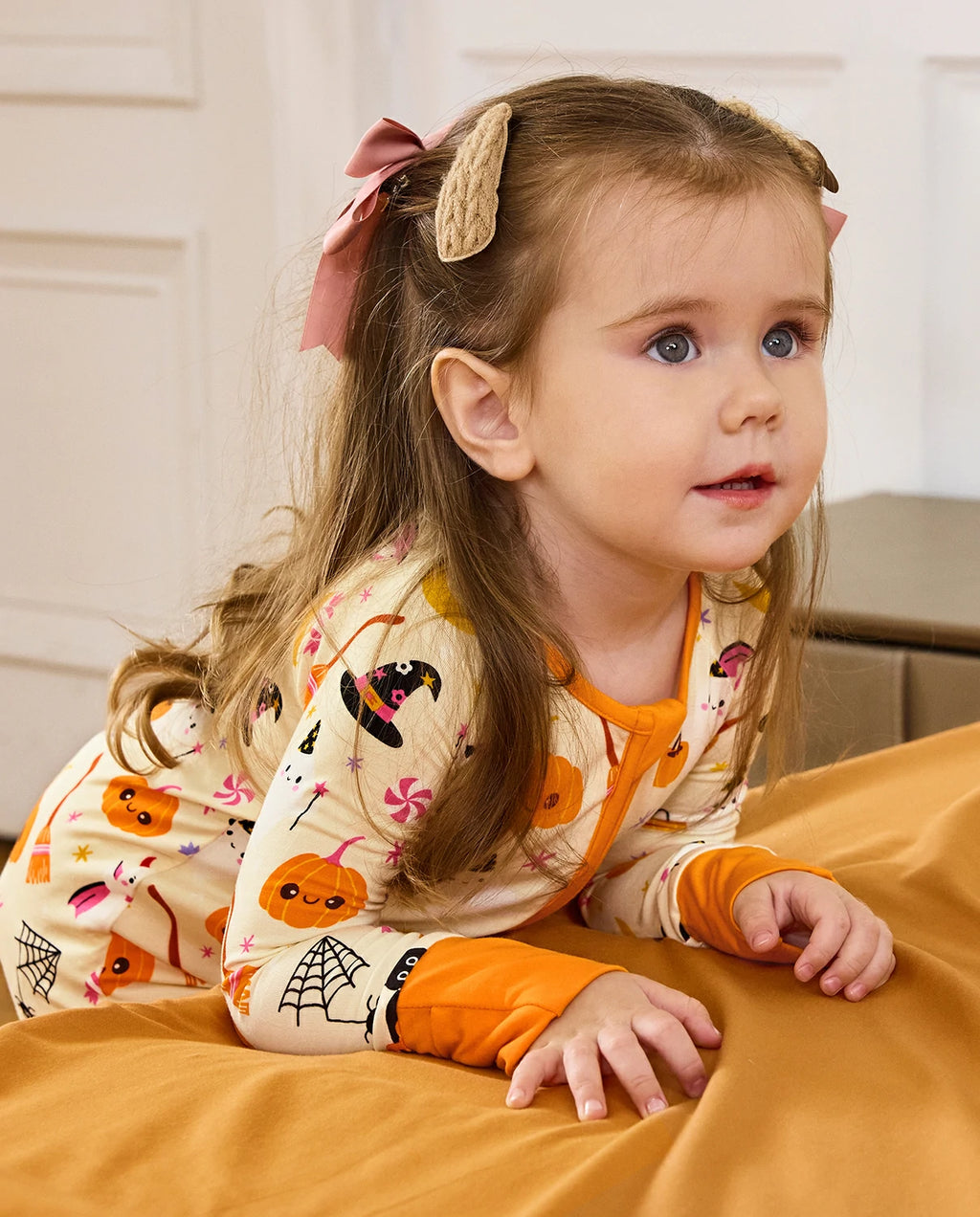 Baby wearing Spooky Sweet Bamboo Zippy with soft Halloween print and comfortable stretch fit