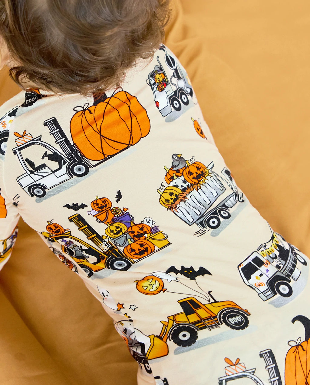 Close-up of Trick Trucks bamboo zippy Halloween truck and pumpkin print
